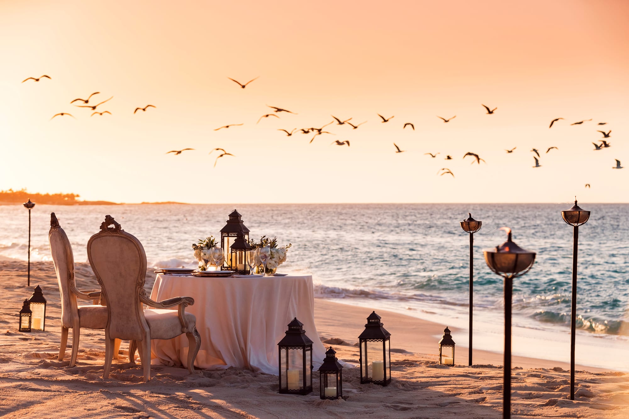 Four Seasons Ocean Club, Bahamas — a sunset beach dinner with lantern light at Four Seasons Ocean Club